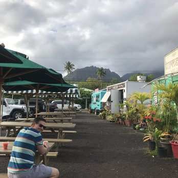 Wake Up Delicious - Food truck area with plenty of tables and a beautiful background - Hawaiian Near Me - Hanalei, Hawaii Wake Up Delicious - Food truck area with plenty of tables and a beautiful background - Hawaiian Near Me - Hanalei, Hawaii