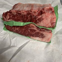 Ray's Retail Meat - Long beef ribs with marbling.
