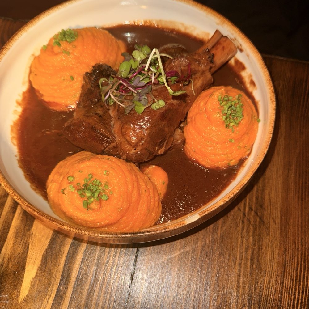 Mango Bay - Lamb shank with sweet potato mash - Caribbean Near Me - Brooklyn, New York Mango Bay - Lamb shank with sweet potato mash - Caribbean Near Me - Brooklyn, New York