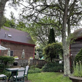 Cafe Alfresco - a table and chairs in the yard - Cafes Near Me - Brewster, Massachusetts