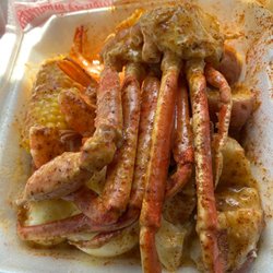 Bo's Crab Spot - Snow crab, corn, potato and eggs covered in garlic gravy sauce!!!