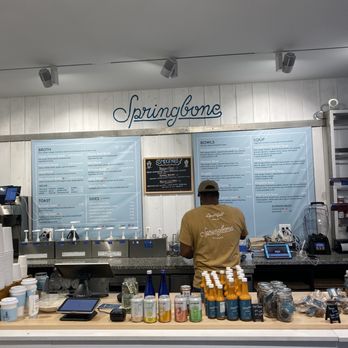 Springbone Kitchen - a man working behind the counter - Soup Near Me - New York, New York Springbone Kitchen - a man working behind the counter - Soup Near Me - New York, New York