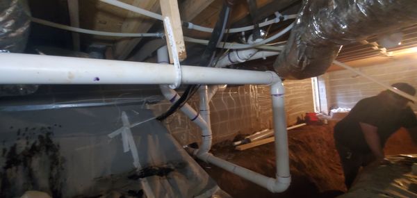 CAST IRON DRAIN LINE REPLACEMENT - The homeowners had been having issues with all of the drains in the home not flowing properly and backing up. Removed all of the old cast iron pipes in the crawlspace and installed new PVC to ensure that they would not have these issues again in the future!