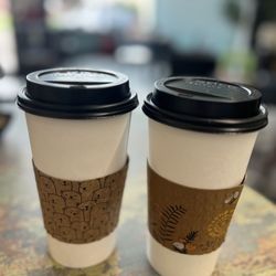 impressed Coffee - Impressed Coffee two coffees. Drinks.