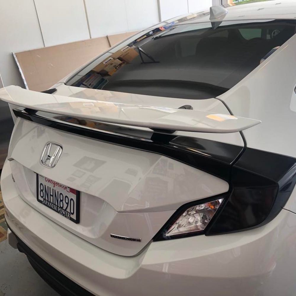 The Tinted tail lights. The Tinted tail lights.