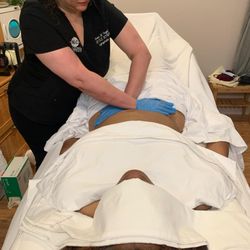 National Lymphatic Centers - Sharon M Vogel, Clinic Director, applying MFR Myofascial release to a Post Plastic Surgery Patient. Healing time is so important.