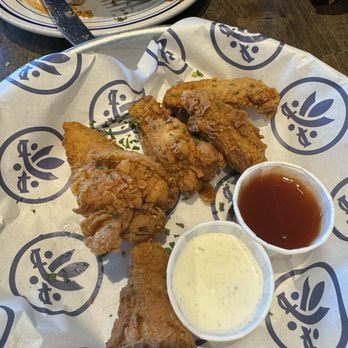 Southerleigh Haute South - Chicken wings , not what we are used. Fried chicken with sos but they were still good. - Southern Near Me - San Antonio, Texas Southerleigh Haute South - Chicken wings , not what we are used. Fried chicken with sos but they were still good. - Southern Near Me - San Antonio, Texas