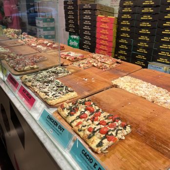 Unregular Pizza - Pizza display - Pizza Near Me - New York, New York Unregular Pizza - Pizza display - Pizza Near Me - New York, New York