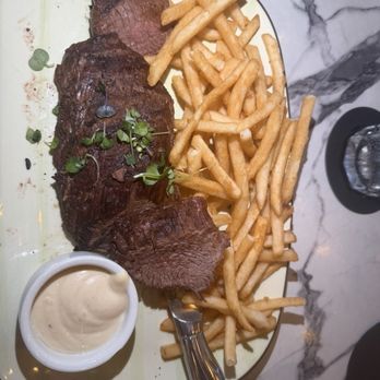Edgewater 122 - Steak Frites* $29 grass fed bistro steak, parmesan fries + roasted garlic aioli I order well done and got medium well. - Salad Near Me - Southport, North Carolina Edgewater 122 - Steak Frites* $29 grass fed bistro steak, parmesan fries + roasted garlic aioli I order well done and got medium well. - Salad Near Me - Southport, North Carolina