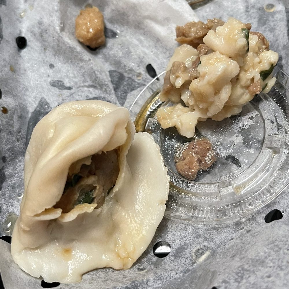 Szechuan's Dumpling - Pork, chive, dumpling on identifiable, meat and side. - Szechuan Near Me - Arlington, Massachusetts