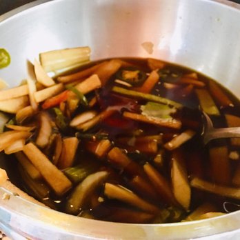 Koriente - Bowl of spicy picked condiments to put on your dishes is delicious - Asian Fusion Near Me - Austin, Texas Koriente - Bowl of spicy picked condiments to put on your dishes is delicious - Asian Fusion Near Me - Austin, Texas