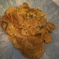 Balandro - Pumpkin ravioli with creamy seafood sauce is delicious