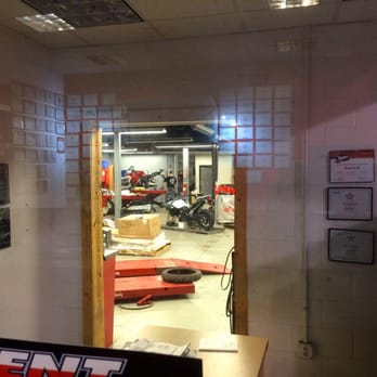 Kent Powersports of Austin - Kent service shop from reception area. - Motorcycle Dealers Near Me - Kyle, Texas
