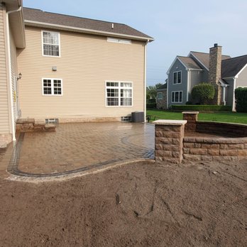 CC's Landscaping - a backyard with a fire pit - Landscaping Near Me - Mayfield Heights, Ohio CC's Landscaping - a backyard with a fire pit - Landscaping Near Me - Mayfield Heights, Ohio