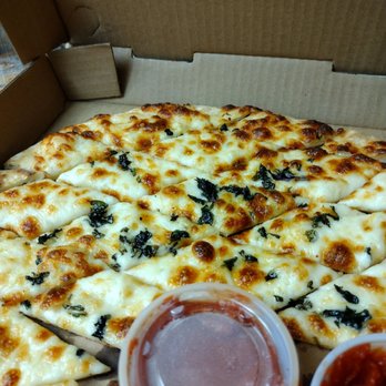 The Blind Onion Pizza & Pub - Garlic chips: pizza crust covered with olive oil, minced garlic, mozzarella, basil and fresh pesto - Pizza Near Me - Reno, Nevada