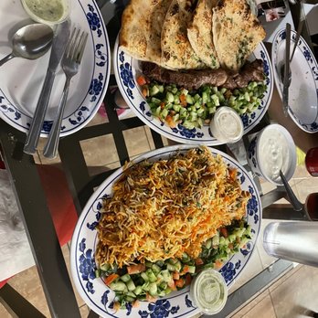 Khyber Halal - two plates of food on a table - Afghan Near Me - Phoenix, Arizona