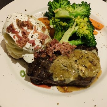 The CattleBaron Steakhouse & Bar - Blue cheese top sirloin with mashed potatoes - Steakhouses Near Me - Calgary, Alberta The CattleBaron Steakhouse & Bar - Blue cheese top sirloin with mashed potatoes - Steakhouses Near Me - Calgary, Alberta