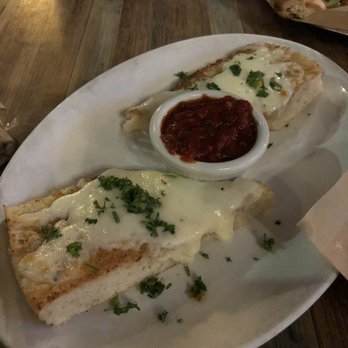 Talarico's Pizzeria - Garlic bread ($3.99+$1 for melted mozzarella) - Pizza Near Me - Seattle, Washington Talarico's Pizzeria - Garlic bread ($3.99+$1 for melted mozzarella) - Pizza Near Me - Seattle, Washington