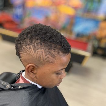Southeast Fades - Mohawk with freestyle design - Barbers Near Me - San Diego, California Southeast Fades - Mohawk with freestyle design - Barbers Near Me - San Diego, California