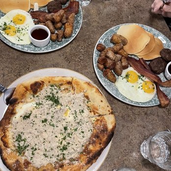 Fire & the Feast - Biscuits and Gravy Pizza, Mangia plate (lemon ricotta pancakes) - Italian Near Me - Edmonds, Washington Fire & the Feast - Biscuits and Gravy Pizza, Mangia plate (lemon ricotta pancakes) - Italian Near Me - Edmonds, Washington