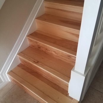 Preferred Flooring Installations - a wooden staircase - Flooring Near Me