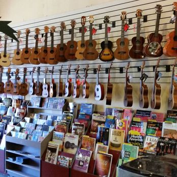 Island Bazaar Ukuleles - Wall of Ukuleles at Island Bazaar Ukes - Musical Instruments & Teachers Near Me - Huntington Beach, California Island Bazaar Ukuleles - Wall of Ukuleles at Island Bazaar Ukes - Musical Instruments & Teachers Near Me - Huntington Beach, California