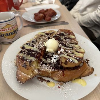 Fat Milo's All Day Cafe - Fancy French Toast with a side of applewood smoked bacon - American Near Me - Sherwood, Oregon Fat Milo's All Day Cafe - Fancy French Toast with a side of applewood smoked bacon - American Near Me - Sherwood, Oregon