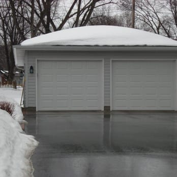 Ocel Builders - a garage in the snow - Roofing Near Me - Farmington, Minnesota Ocel Builders - a garage in the snow - Roofing Near Me - Farmington, Minnesota