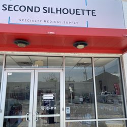 Second Silhoutte - Entrance on side street. Parking out back. Front facing Kirby next to Shoe Hospital.