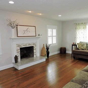Northeast Residential - living room with wood floors and fireplace - Handyman Near Me