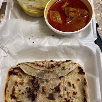 Rasa Ria - Chicken Rendang and Roti Canai with Chicken curry dipping sauce. Very, very good.  Trying new foods, this is a winner - Indonesian Near Me - Kalamazoo, Michigan
