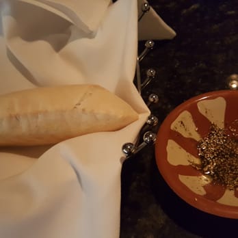 Phoenician Taverna - The fresh warm bread served with oil. - Mediterranean Near Me - Mason, Ohio Phoenician Taverna - The fresh warm bread served with oil. - Mediterranean Near Me - Mason, Ohio