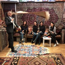 Hakan Evin Rug Store - They are looking at flying rug