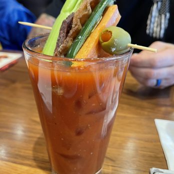 Guy Fieri's Branson Kitchen + Bar - Bloody Mary with jalapeño, jerky, carrot, celery and bacon. - Bars Near Me - Branson, Missouri Guy Fieri's Branson Kitchen + Bar - Bloody Mary with jalapeño, jerky, carrot, celery and bacon. - Bars Near Me - Branson, Missouri