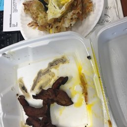 bacon and eggs in a styrofoam container bacon and eggs in a styrofoam container