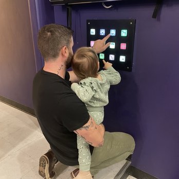 MY Museum - Playing with the TV sound buttons - Children's Museums Near Me - Monterey, California