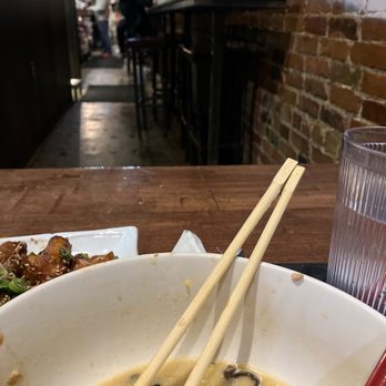 Oni Ramen - Bar seating facing the brick wall. - Ramen Near Me - Dallas, Texas Oni Ramen - Bar seating facing the brick wall. - Ramen Near Me - Dallas, Texas