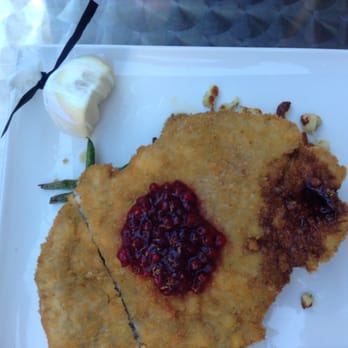 Bier Markt - Pork Schnitzel with haricots verts and lingonberry jam. - Bars Near Me - Toronto, Ontario Bier Markt - Pork Schnitzel with haricots verts and lingonberry jam. - Bars Near Me - Toronto, Ontario