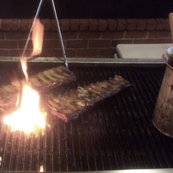 Spring Creek Barbeque - Ribs being warmed up before serving... - Barbeque Near Me - Spring, Texas Spring Creek Barbeque - Ribs being warmed up before serving... - Barbeque Near Me - Spring, Texas
