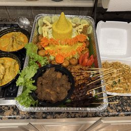Nasi Tumpeng catering order for 10 people. Nasi Tumpeng catering order for 10 people.
