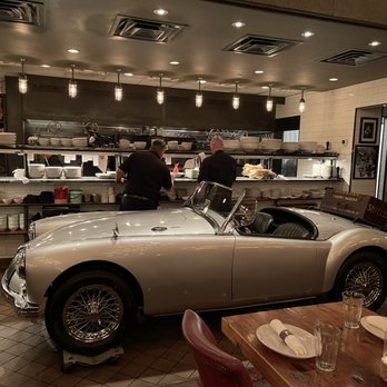Town Hearth - Beautifully restored 1953 MG Spider in front of the kitchen - American Near Me - Dallas, Texas Town Hearth - Beautifully restored 1953 MG Spider in front of the kitchen - American Near Me - Dallas, Texas