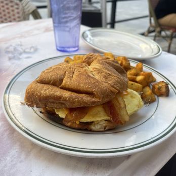 Maxie's - Croissant breakfast sandwich with home fries - Breakfast & Brunch Near Me - Las Vegas, Nevada