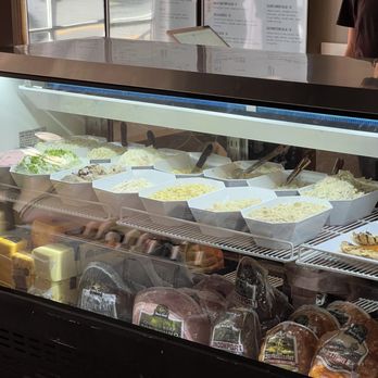 Lawrenceville Sandwich - a man standing in front of a deli counter - Sandwiches Near Me - Lawrence Township, New Jersey Lawrenceville Sandwich - a man standing in front of a deli counter - Sandwiches Near Me - Lawrence Township, New Jersey