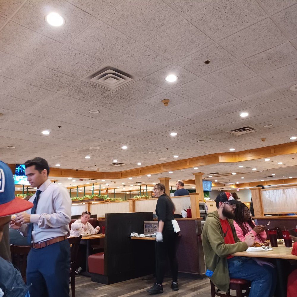 United Buffet - a group of people eating in a restaurant - Buffets Near Me - Schenectady, New York