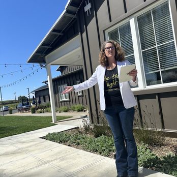 Migration Winery - Kate leading us while enjoying a glass! - Wine Tasting Room Near Me - Napa, California Migration Winery - Kate leading us while enjoying a glass! - Wine Tasting Room Near Me - Napa, California