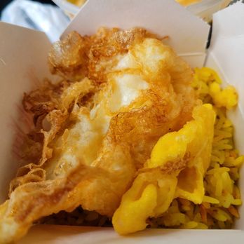 Manao Thai Street Eats - Fried egg over tumeric rice - Thai Near Me - Seattle, Washington Manao Thai Street Eats - Fried egg over tumeric rice - Thai Near Me - Seattle, Washington