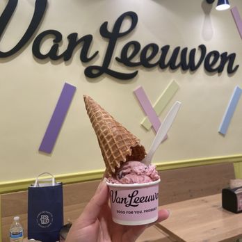 Van Leeuwen Ice Cream - Signage and Black Cherry Chip topped with a waffle cone - Ice Cream & Frozen Yogurt Near Me - New York, New York Van Leeuwen Ice Cream - Signage and Black Cherry Chip topped with a waffle cone - Ice Cream & Frozen Yogurt Near Me - New York, New York