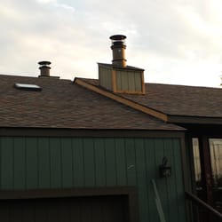 The Roof Doctor - Job in St. Clair Shores using Owens Corning Duration in Aged Copper.  The customer LOVED the color and the roof & skylights. Happy customer!