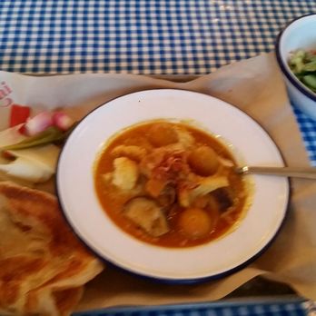 Hat Yai - Vegetarian Curry with Cucumber side salad. Very good, love the flavour and the bread they throw in on the side! - Thai Near Me - Portland, Oregon Hat Yai - Vegetarian Curry with Cucumber side salad. Very good, love the flavour and the bread they throw in on the side! - Thai Near Me - Portland, Oregon