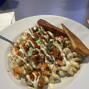 Serious Dogs - Buffalo chic, mac with ranch dressing & buffalo sauce with hopped green onions & crispy chicken & 2 slices of toast - Hot Dogs Near Me - Battle Creek, Michigan Serious Dogs - Buffalo chic, mac with ranch dressing & buffalo sauce with hopped green onions & crispy chicken & 2 slices of toast - Hot Dogs Near Me - Battle Creek, Michigan